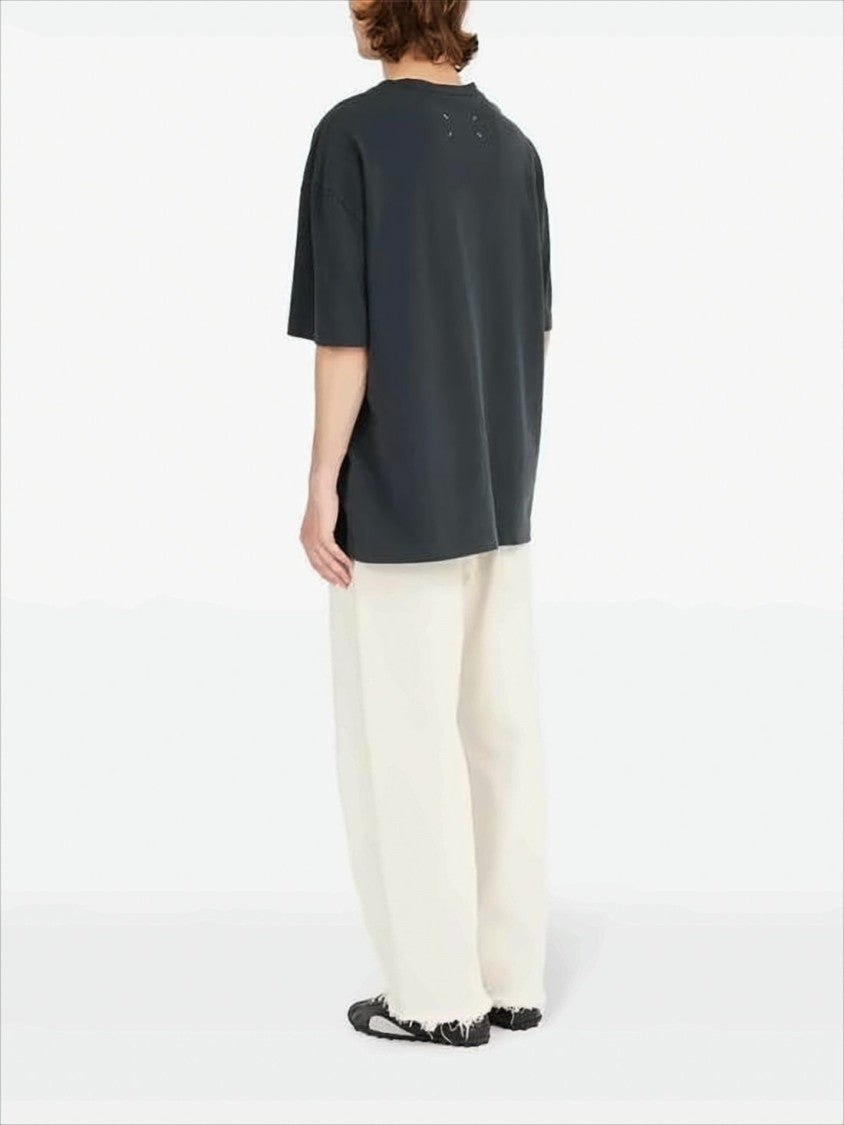 Maison Margiela Minimalist Black Short-Sleeved T-Shirt With Tonal Embossed Design