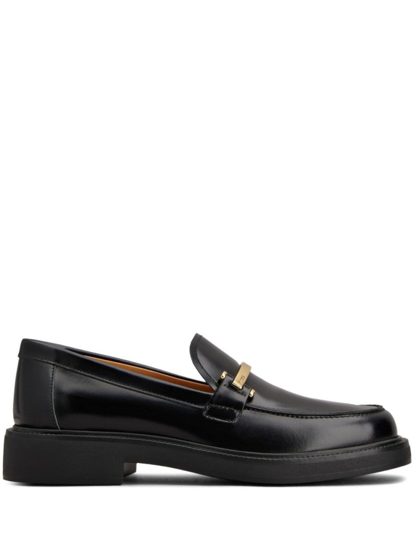 Tod's Black Minimalist Round Toe Slip-On Flats