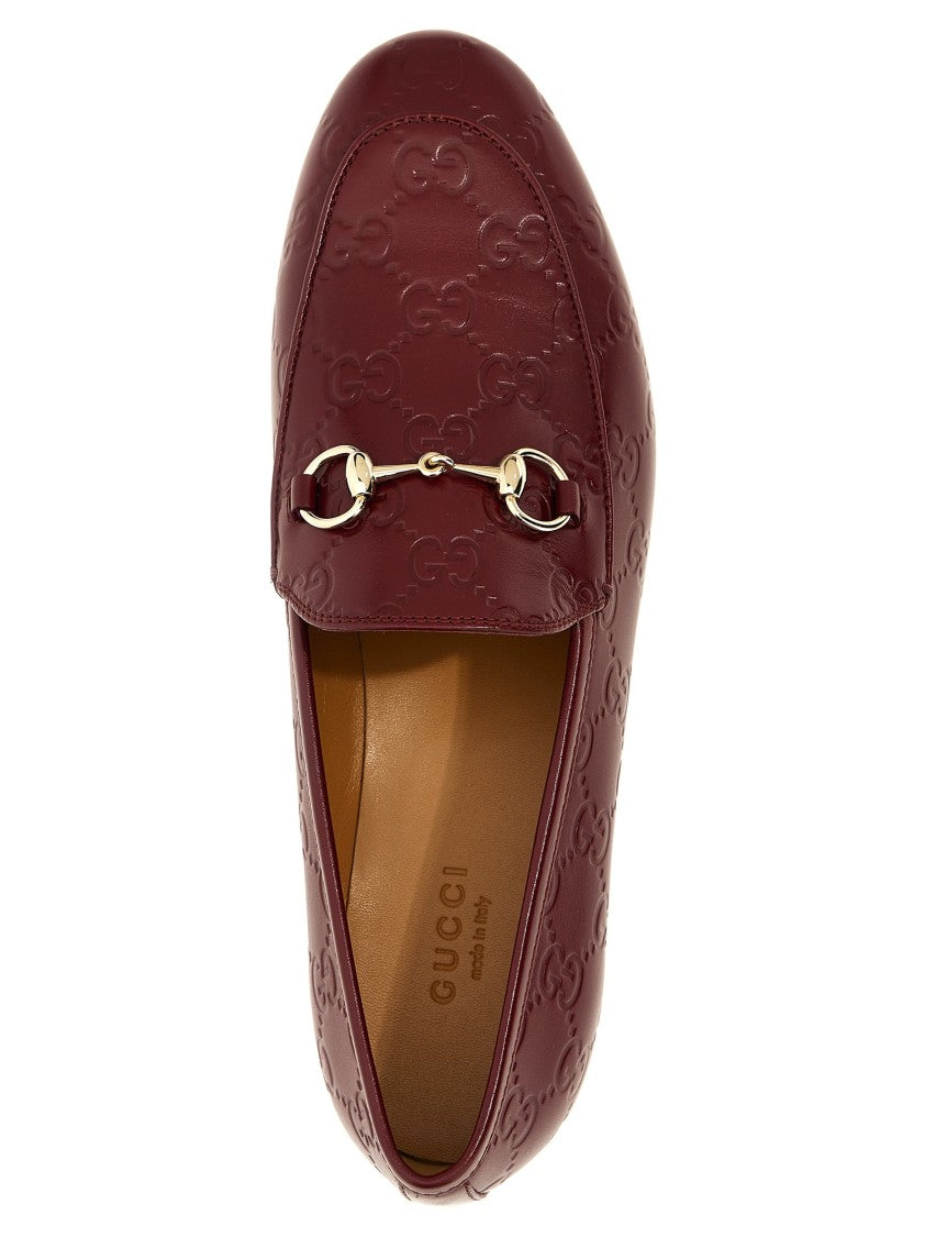 Gucci Gg Leather Jordaan Loafers With Metal Clamp Detail
