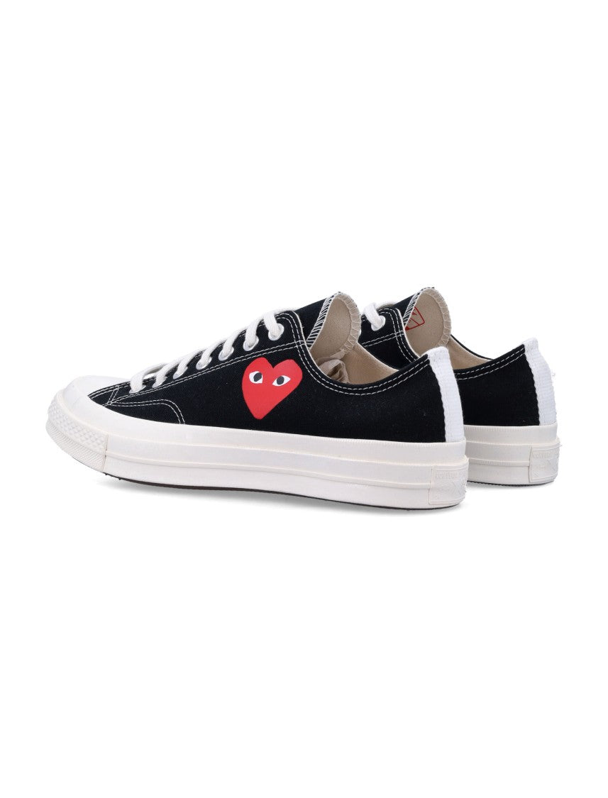 Comme Des Garçons X Converse Iconic Canvas Sneakers With Distinctive Heart Design