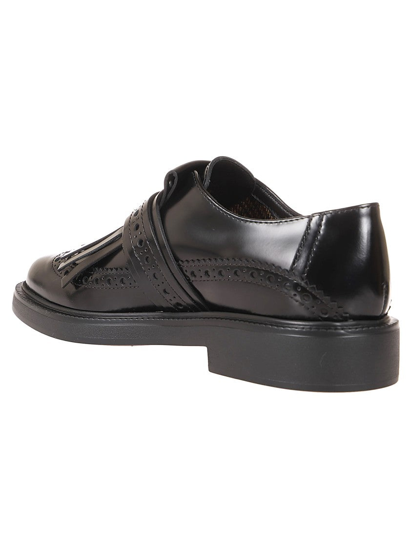 Tod's Leather Moccasins With Decorative Fringe And Buckle Strap