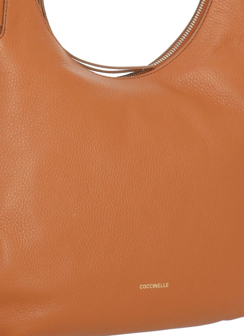 Coccinelle Medium-Sized Pebbled Leather Shoulder Bag With Removable Strap