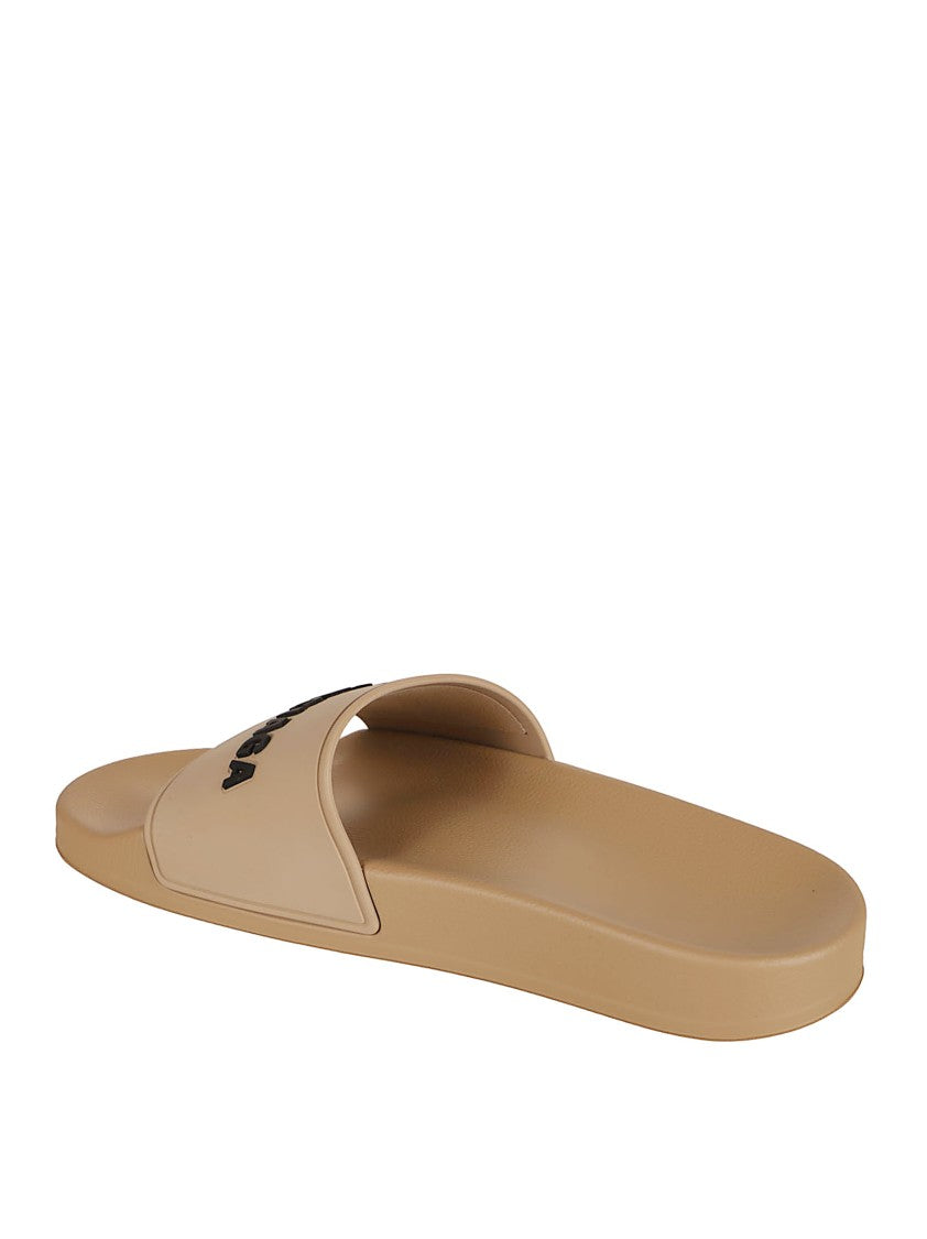 Balenciaga Minimalist Beige Rubber Sandals With Printed Logo