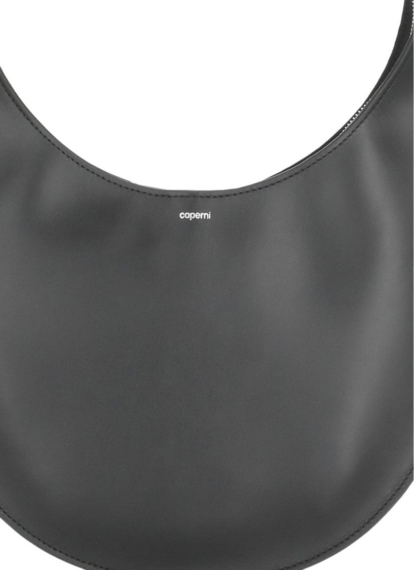 Coperni Crescent-Shaped Soft Leather Shoulder Bag With Contrasting Logo