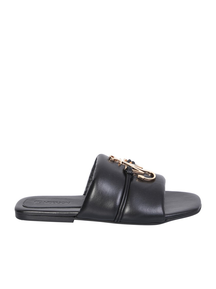 J. W. Anderson Elegant Flat Rubber Sole Sandals With Iconic Motif And Gold Tone Hardware Accents