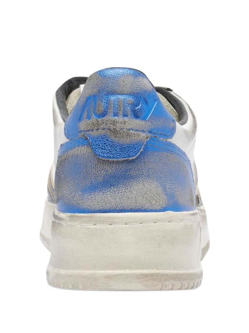 Autry Distressed White Leather Sneakers With Navy Accents
