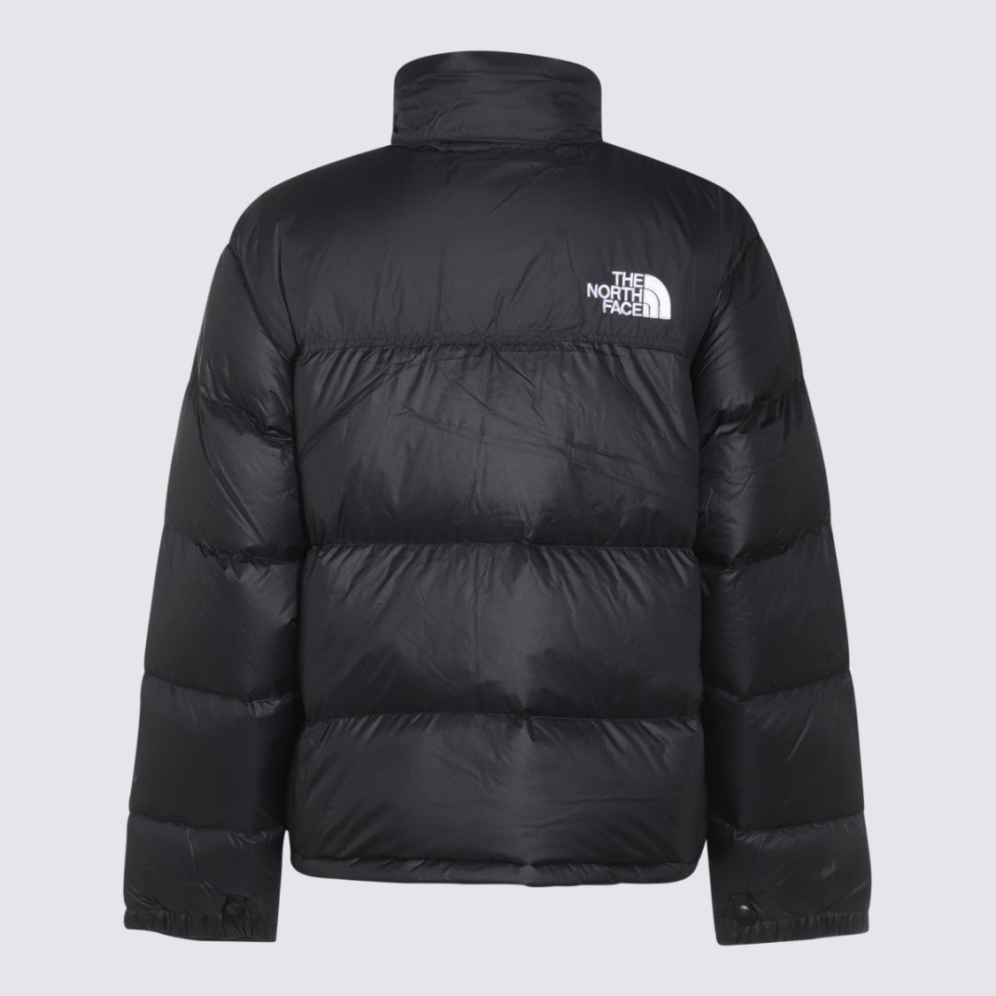 The North Face Black Quilted Puffer Jacket With High Collar And Adjustable Cuffs