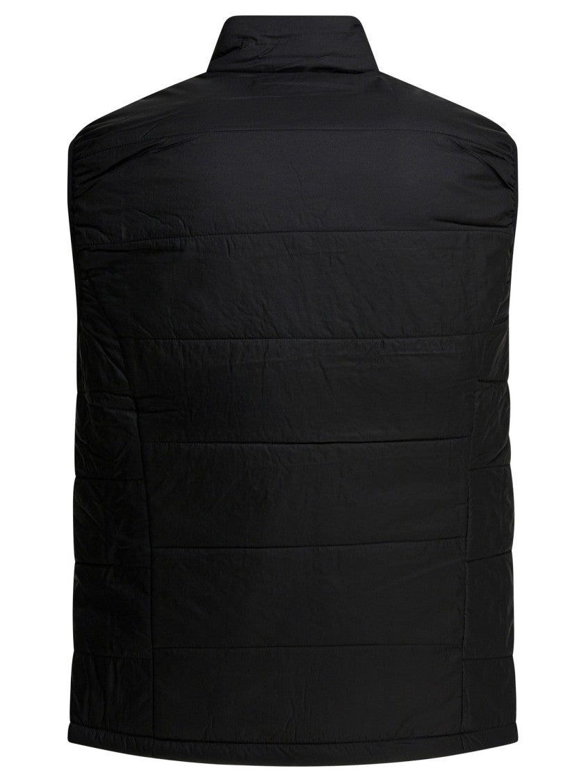 Montbell Sleeveless Jacket With Durable Nylon Exterior And Polyester Padding