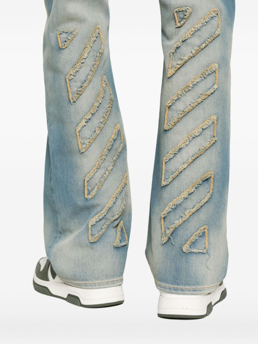 Off-White Relaxed-Fit Faded Denim Jeans With Frayed Stripe Detail