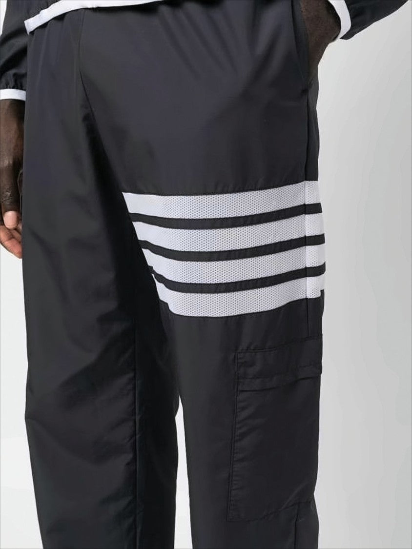 Thom Browne Sleek Black Training Jogger Pants With Distinctive Stripes