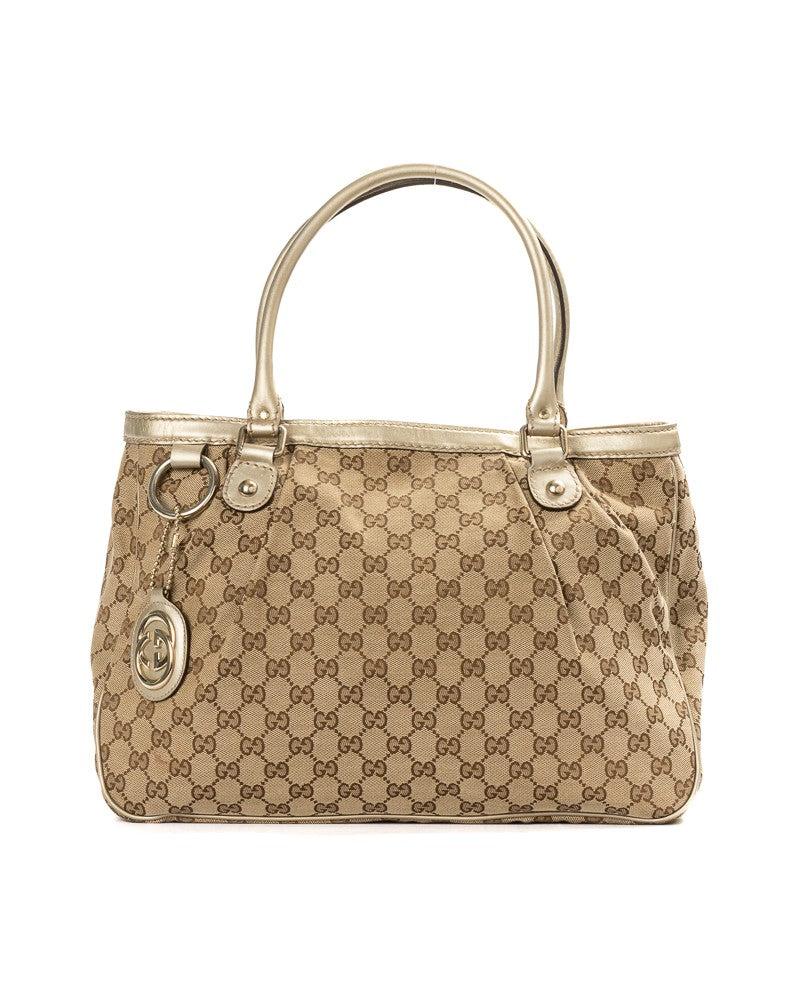 Gucci Sukey Medium Gg Supreme In Gold