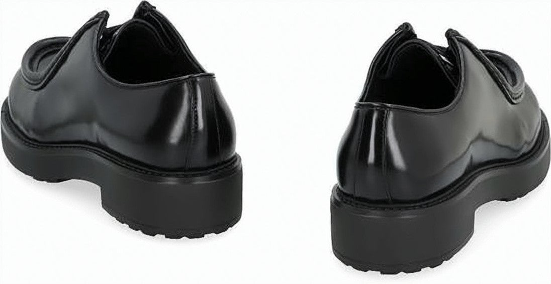 Prada Polished Leather Loafers With Chunky Sole And Elevated Heel