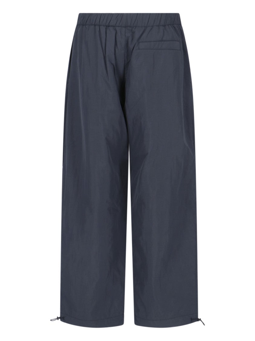 Studio Nicholson "Nixie" Blue Nylon Trousers