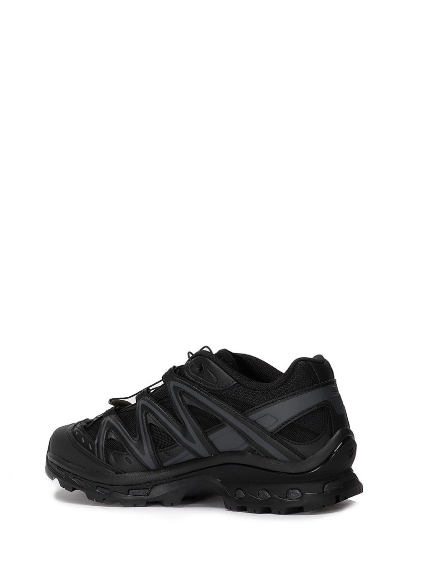 Salomon Streamlined Black Athletic Sneakers With Textured Sole