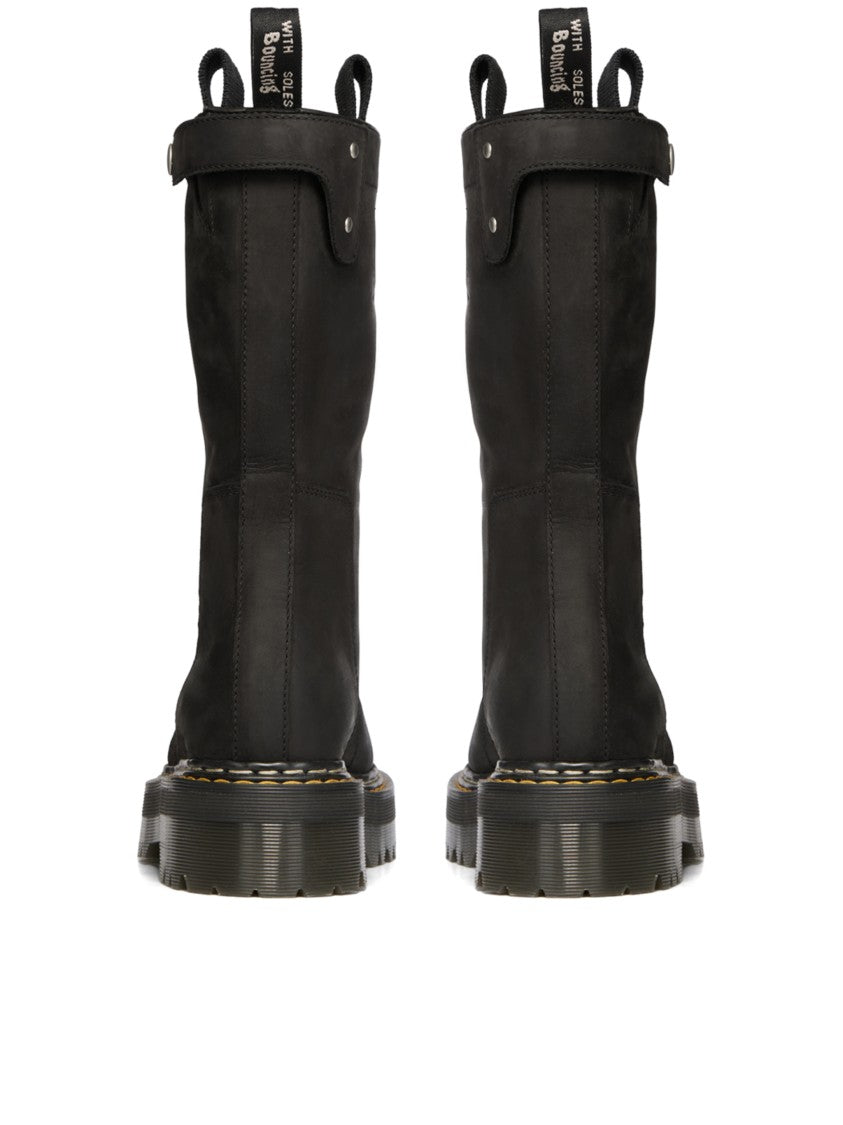 Dr. Martens Mid-Calf Pull-On Boots With Chunky Ridged Sole And Rugged Detailing