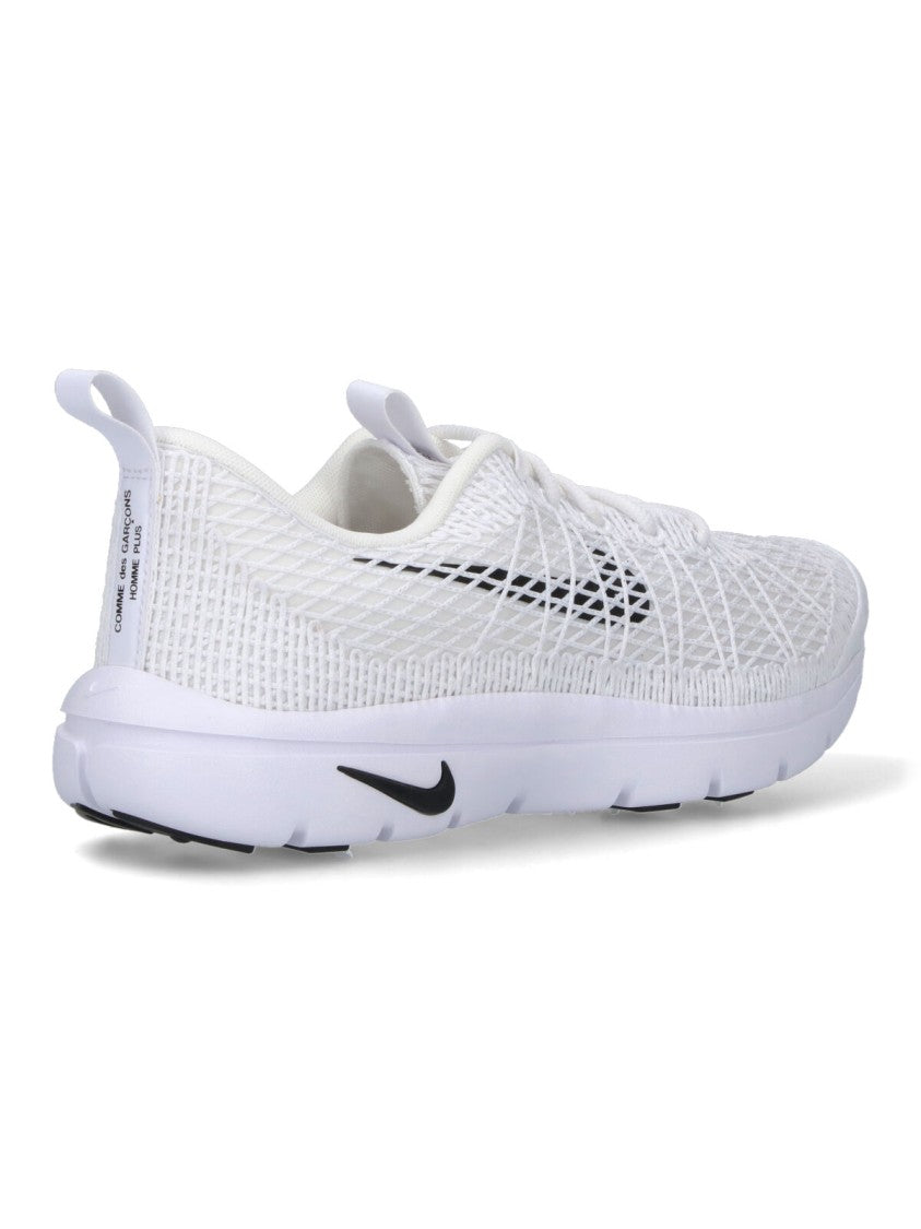 Comme Des Garçons Low-Profile White Sneakers With Subtle Textured Upper