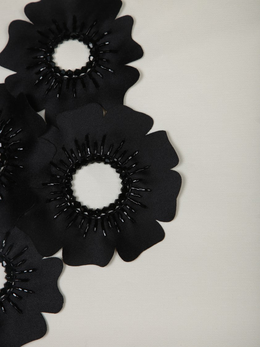 Msgm Sleeveless Top With Black Floral Embellishments