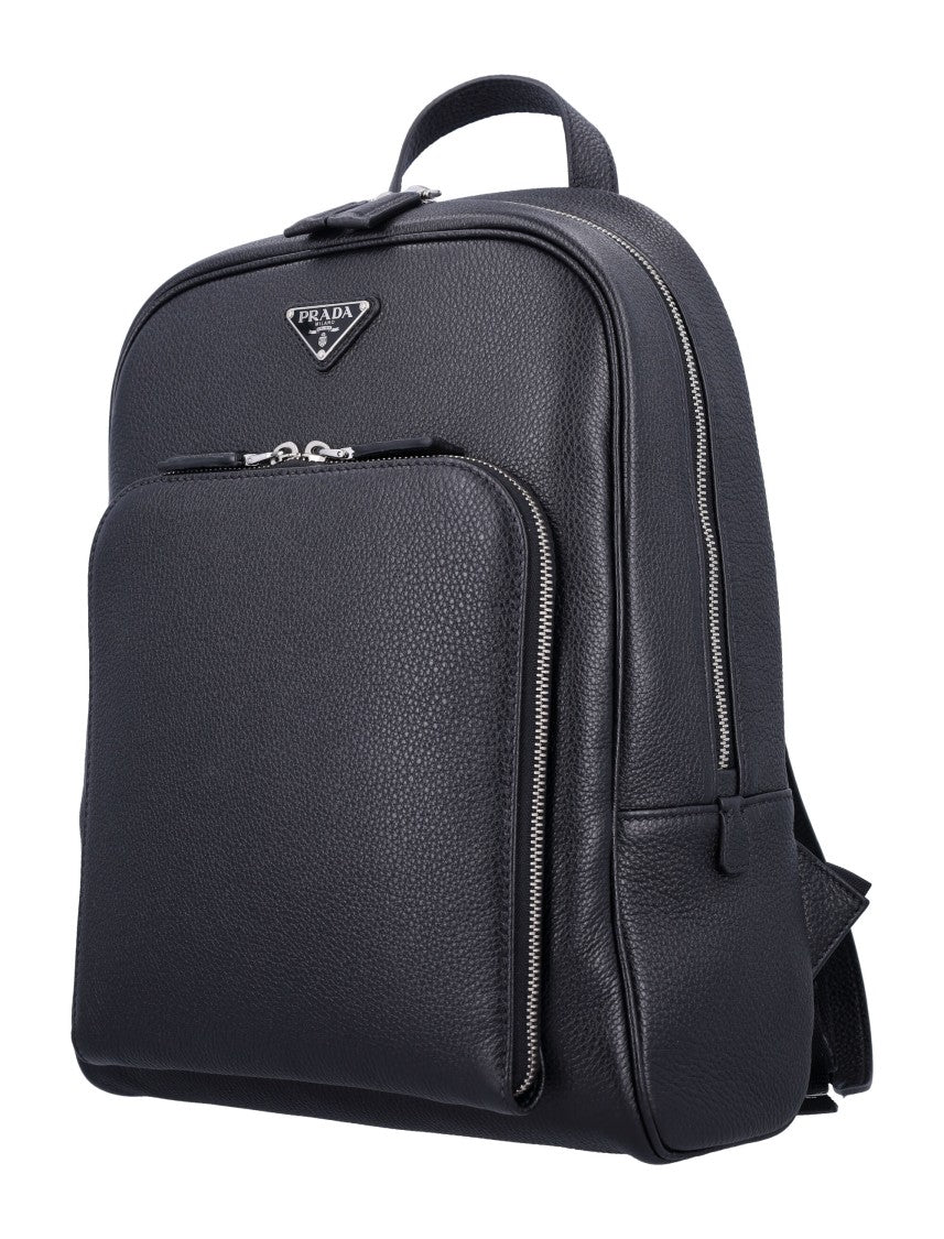 Prada Pebbled Leather Backpack With Top Handle And Adjustable Straps