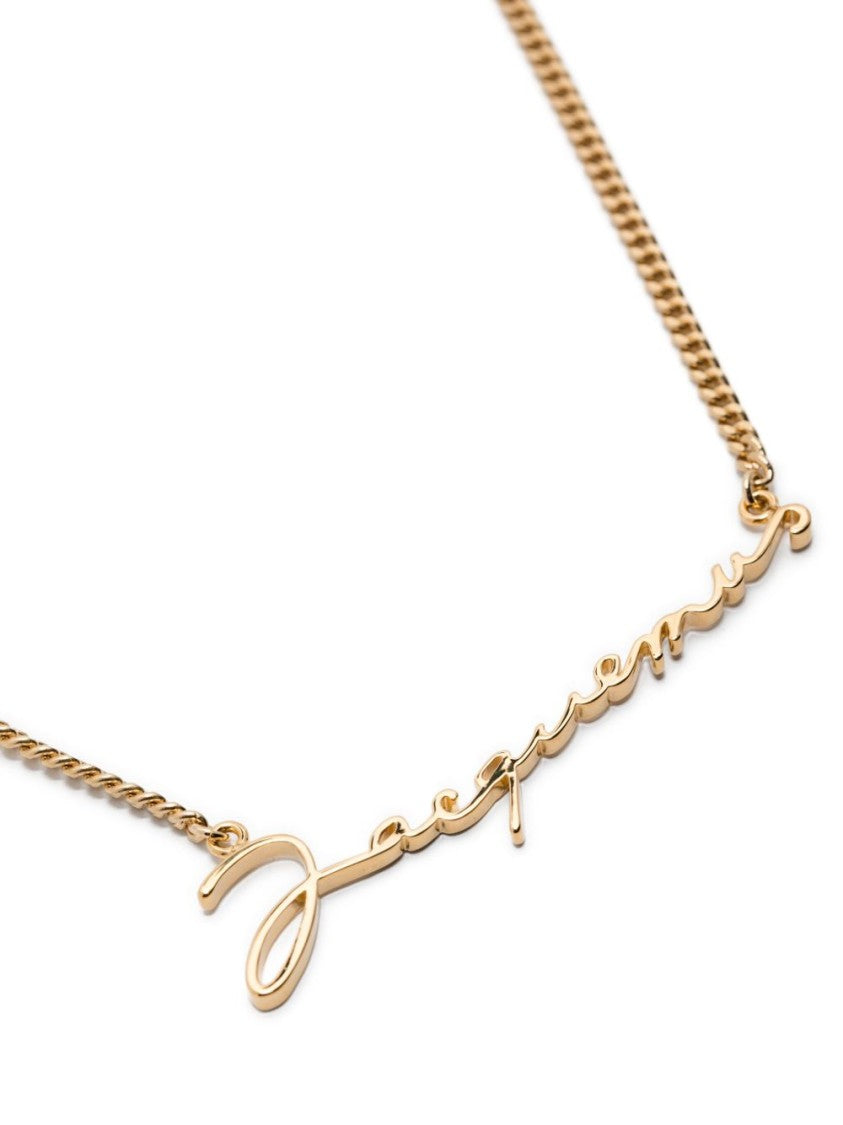 Jacquemus Gold Tone Cursive Logo Pendant Necklace