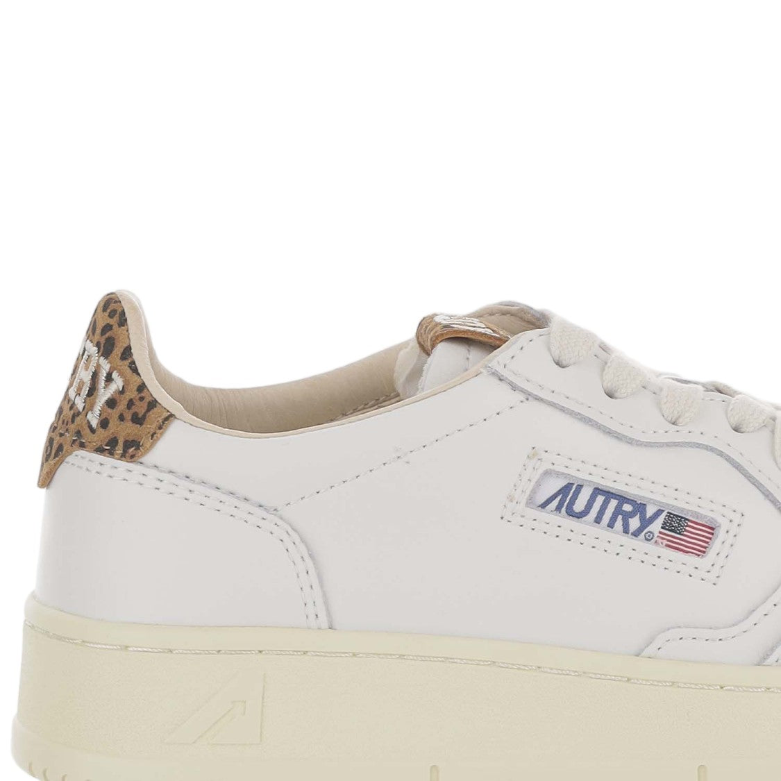 Autry Low-Top Leather Sneakers With Suede Heel Tab And Logo Accents