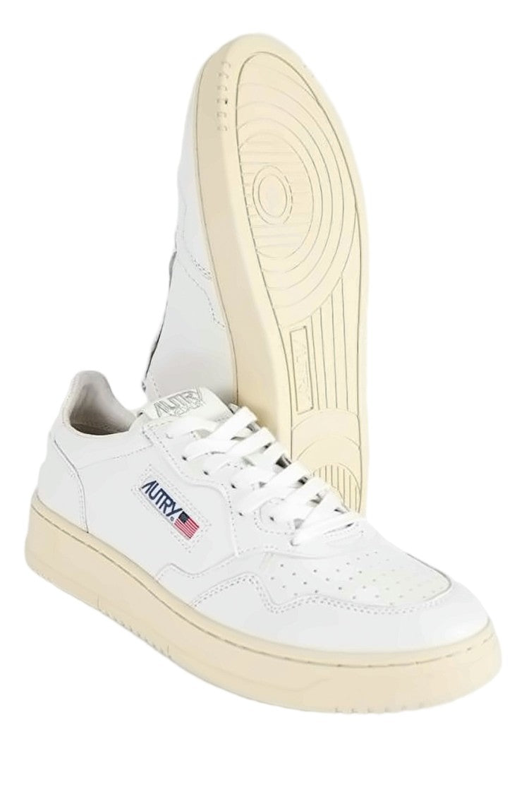 Autry Minimalist Low-Top Sneakers With Perforated Detailing