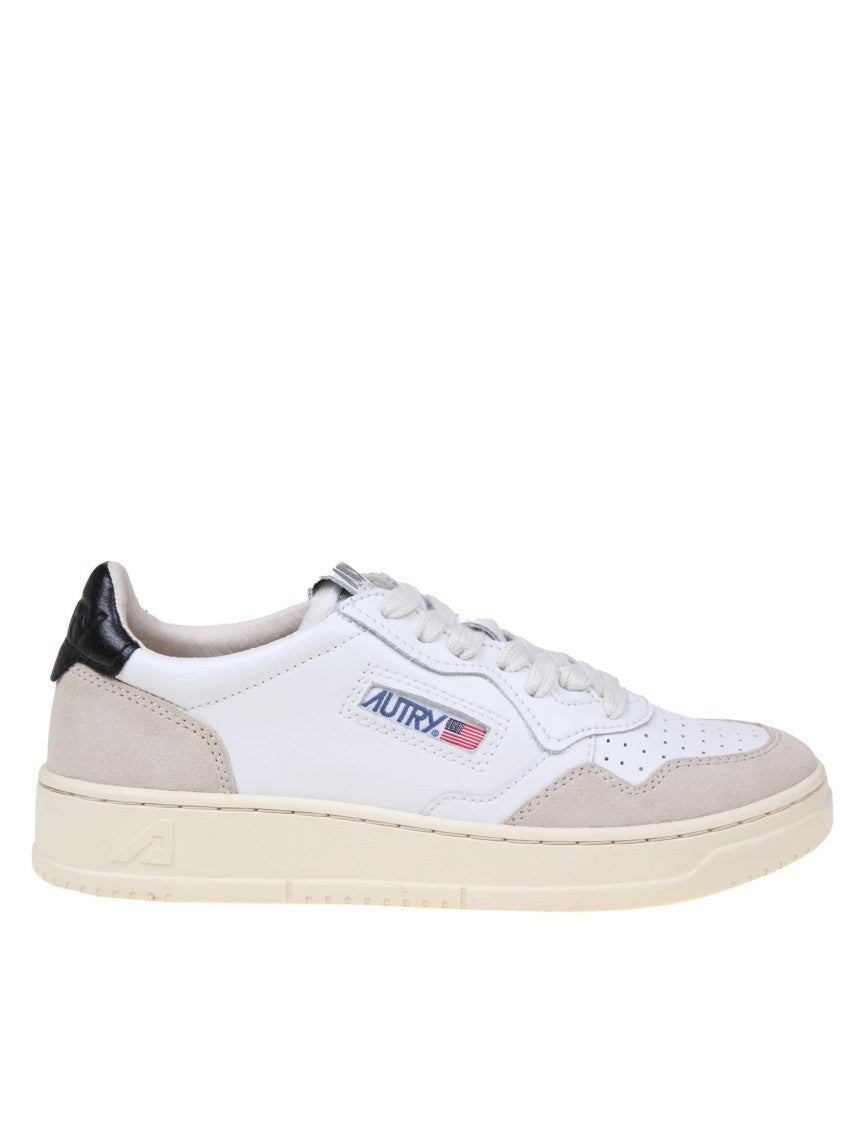 Autry Sneakers In Black And White Leather And Suede