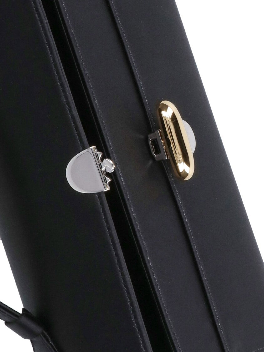 Savette Structured Black Handbag With Versatile Carrying Options