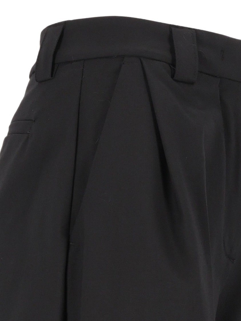 The Latest Dakota High-Waist Pleated Wool Wide-Leg Pants