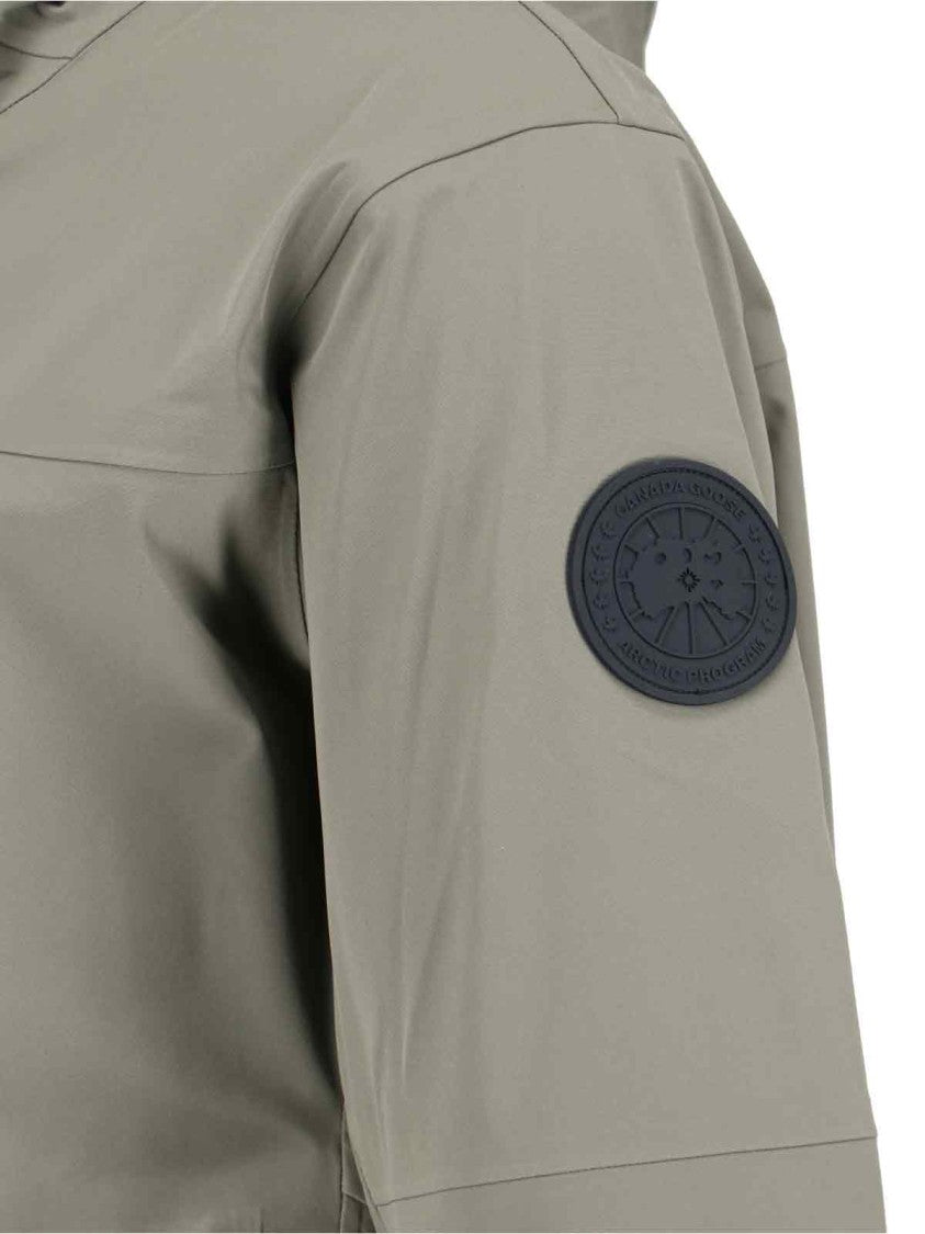 Canada Goose Minimalist Green Jacket With Concealed Zipper And Functional Features