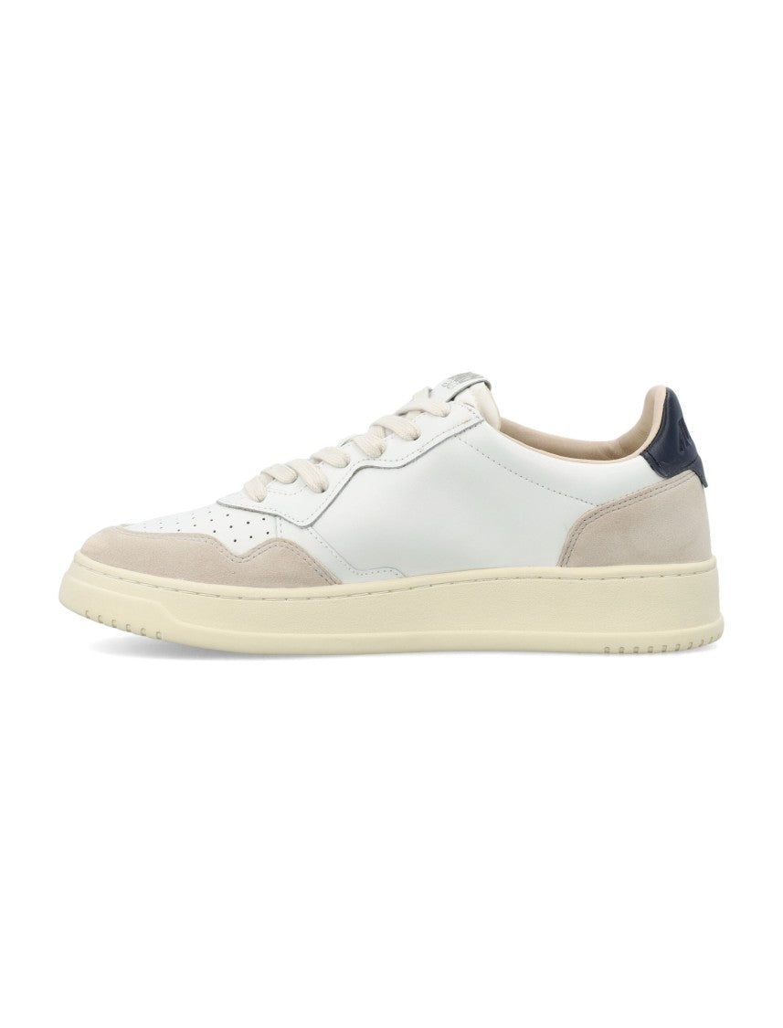 Autry Contemporary Tennis Sneakers With Suede Overlays And Contrasting Detail