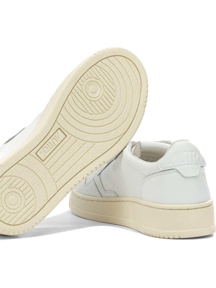 Autry Minimalist Low-Top Sneakers With Perforated Detailing
