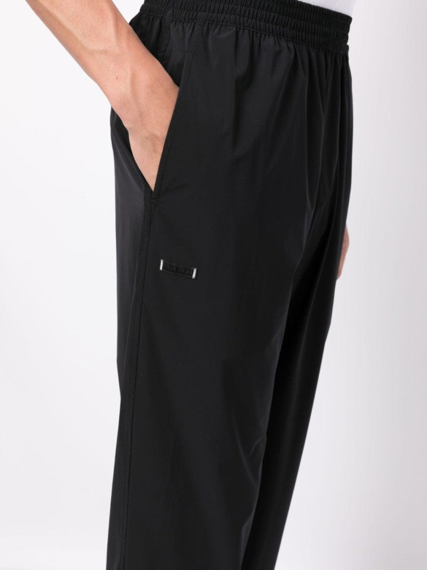 True Tribe Elasticated-Waist Trousers With Logo Patch And Slim Cut