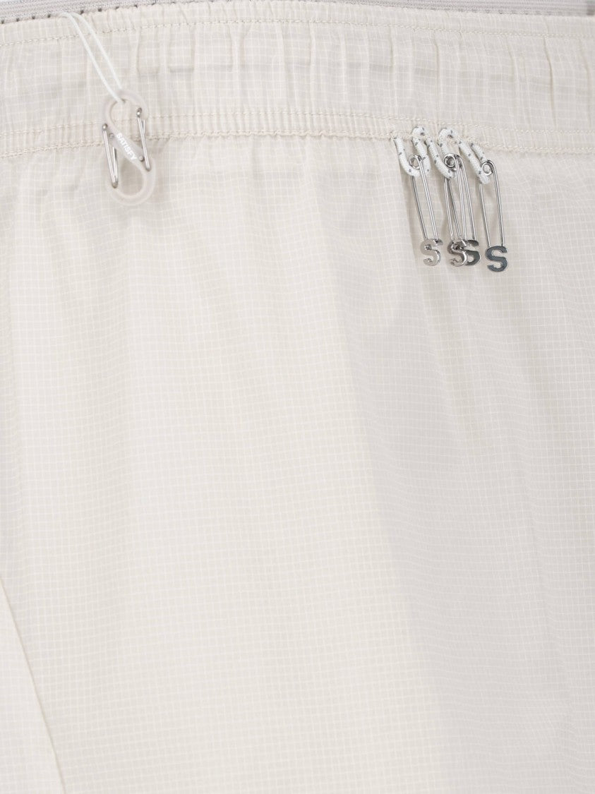 Satisfy Layered White Trousers With Utility Details