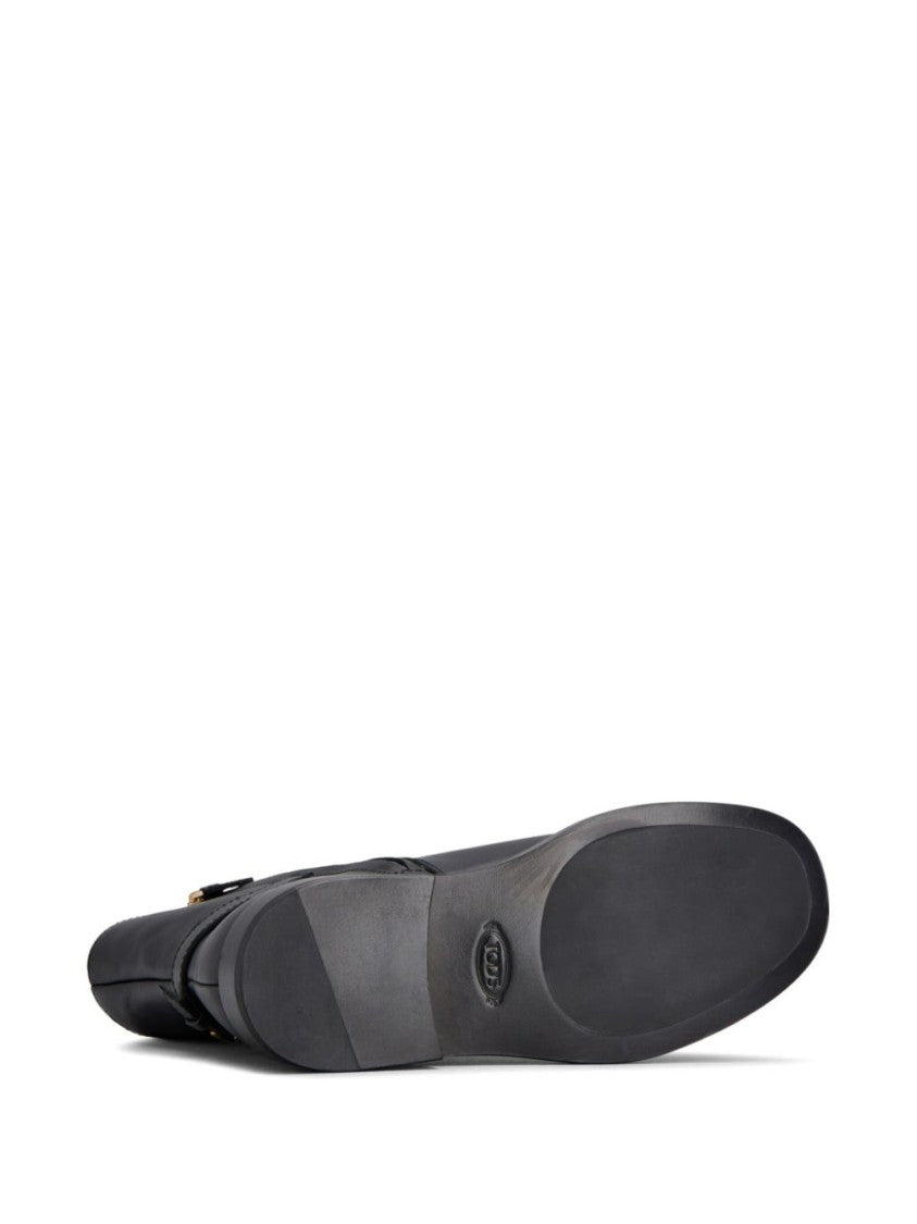 Tod's Minimalist Black Ankle Boots With Gold Accent