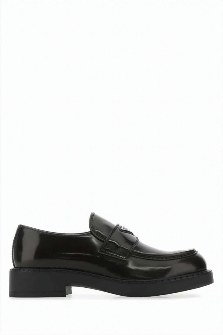 Prada Polished Black Penny Loafers