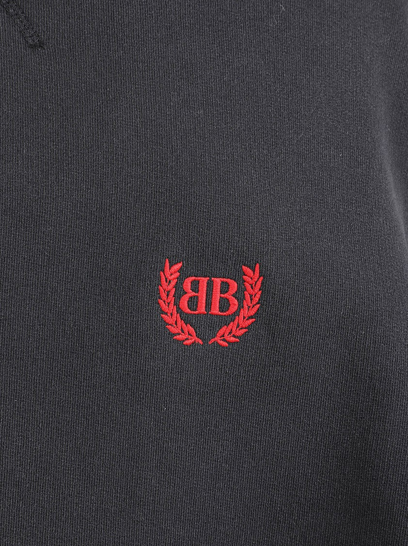 Balenciaga Oversized Black Sweatshirt Dress With Pleated Skirt And Logo Emblem