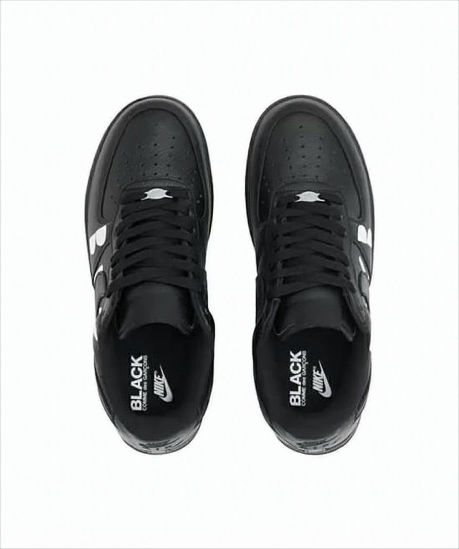 Comme Des Garçons Perforated Black Leather Sneakers With Graphic Detailing