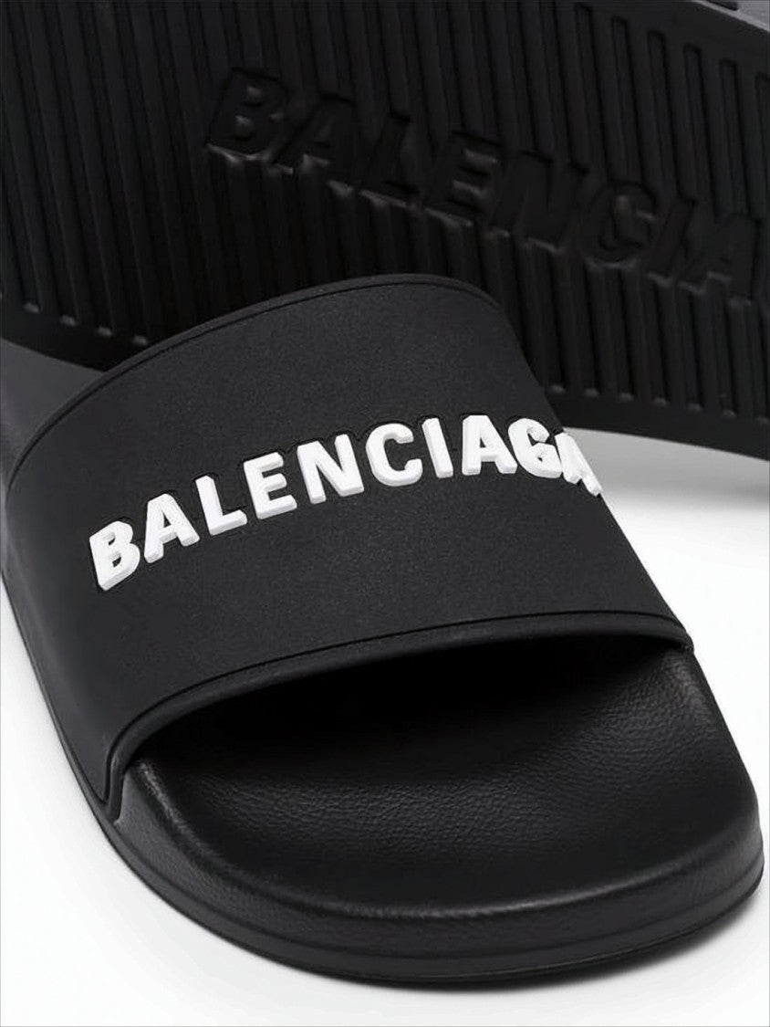 Balenciaga Contemporary Black Rubber Slide Sandals With Embossed Branding
