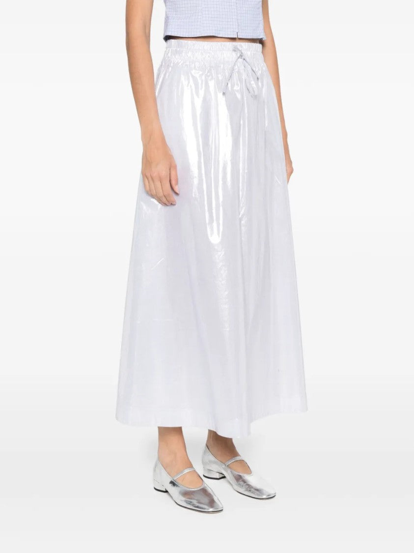 D. Exterior Smooth Silhouette Subtle Texture Skirt