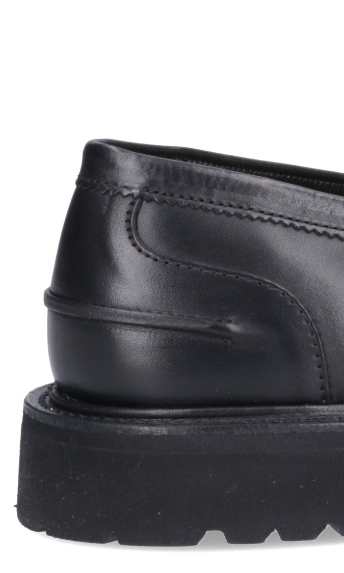 Tricker's Sleek Leather Penny Loafers With Sturdy Rubber Sole