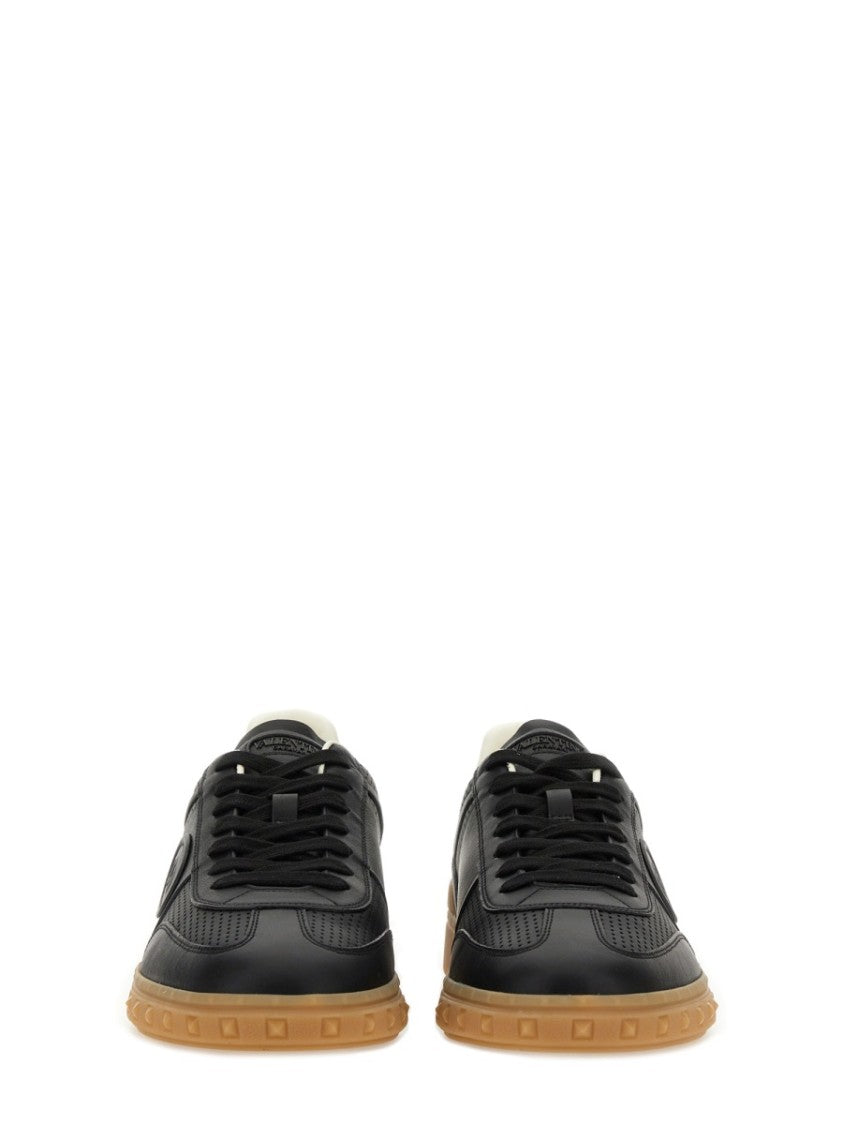 Valentino Garavani Black Low-Top Sneakers With Perforated Leather Accents