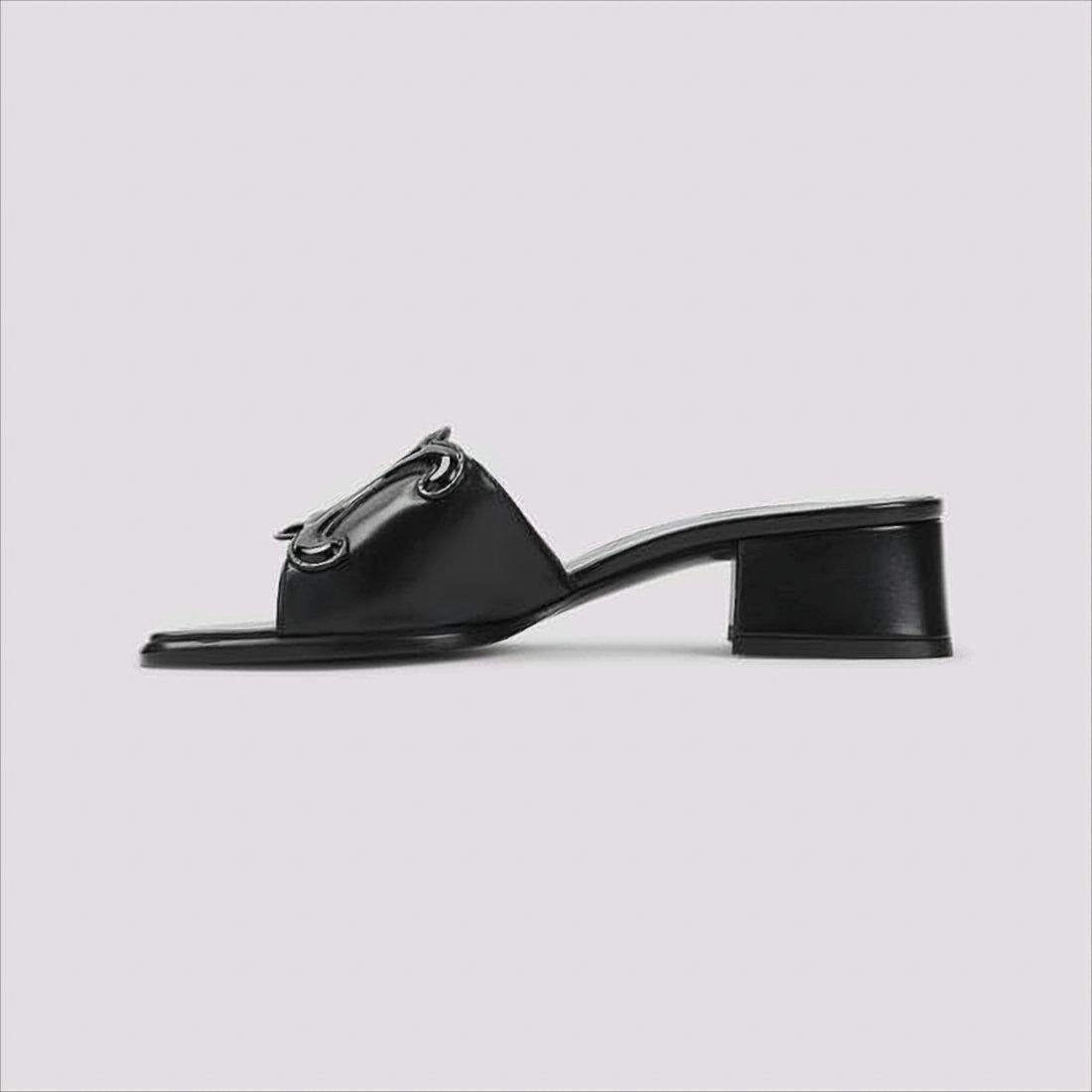 Celine Open Toe Mules With Glossy Emblem Detail