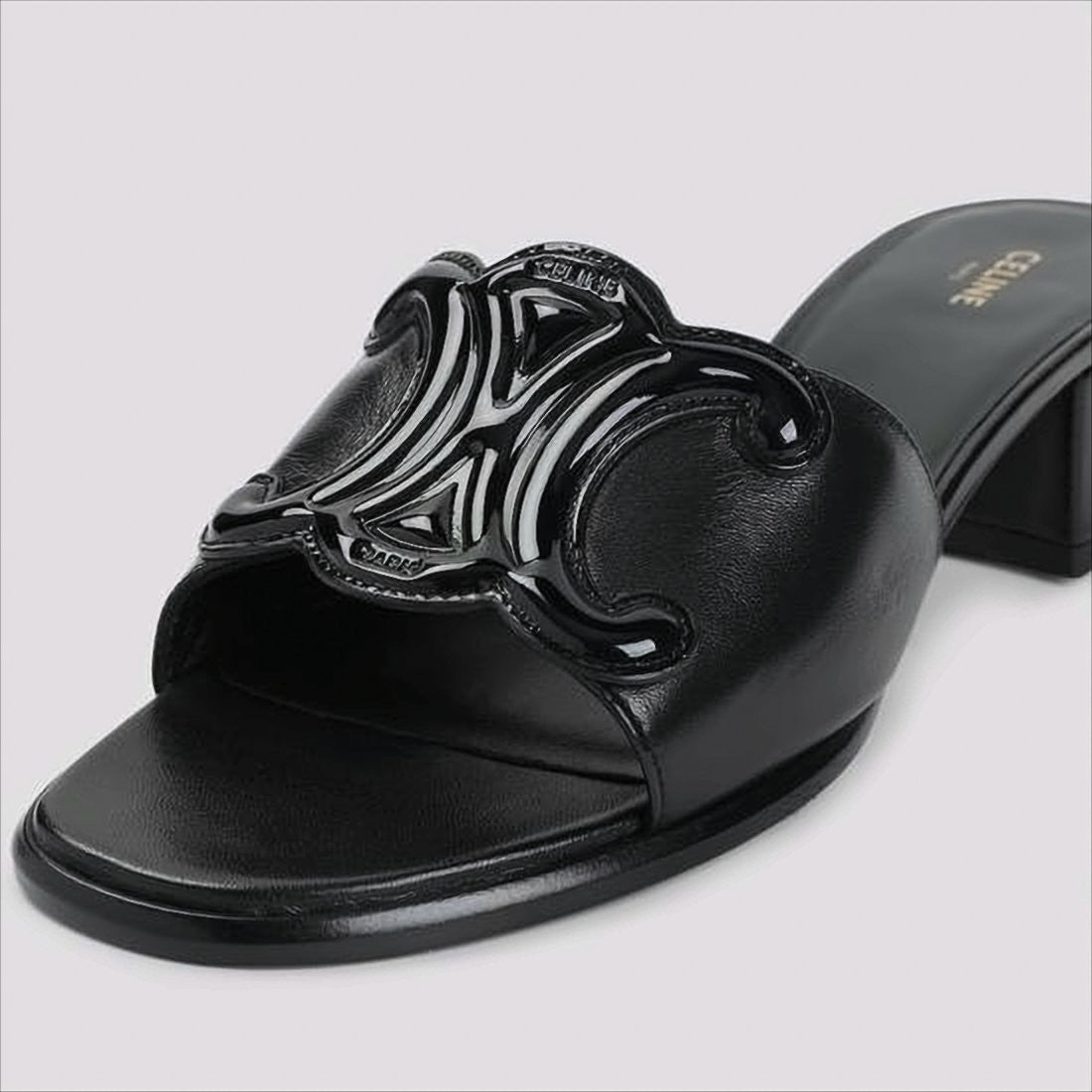 Celine Open Toe Mules With Glossy Emblem Detail