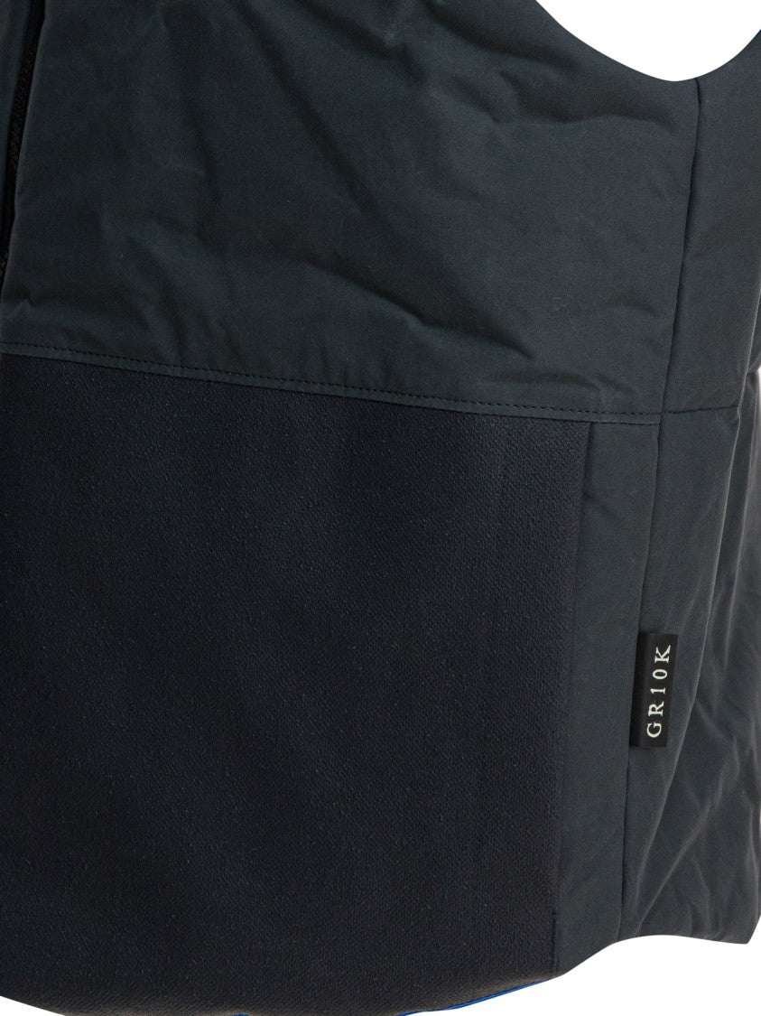 Gr10k Padded Cotton Sleeveless Jacket With Two-Tone Design