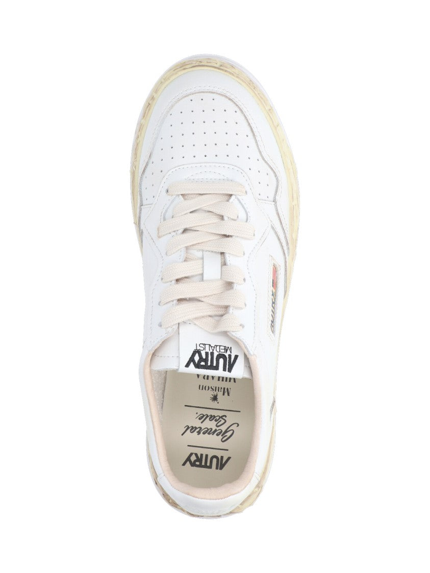 Autry Calfskin Low-Top Sneakers With Vintage Detailing