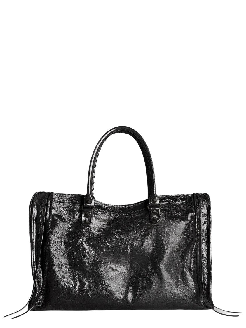 Balenciaga Textured Leather Travel Bag With Removable Charm And Adjustable Strap