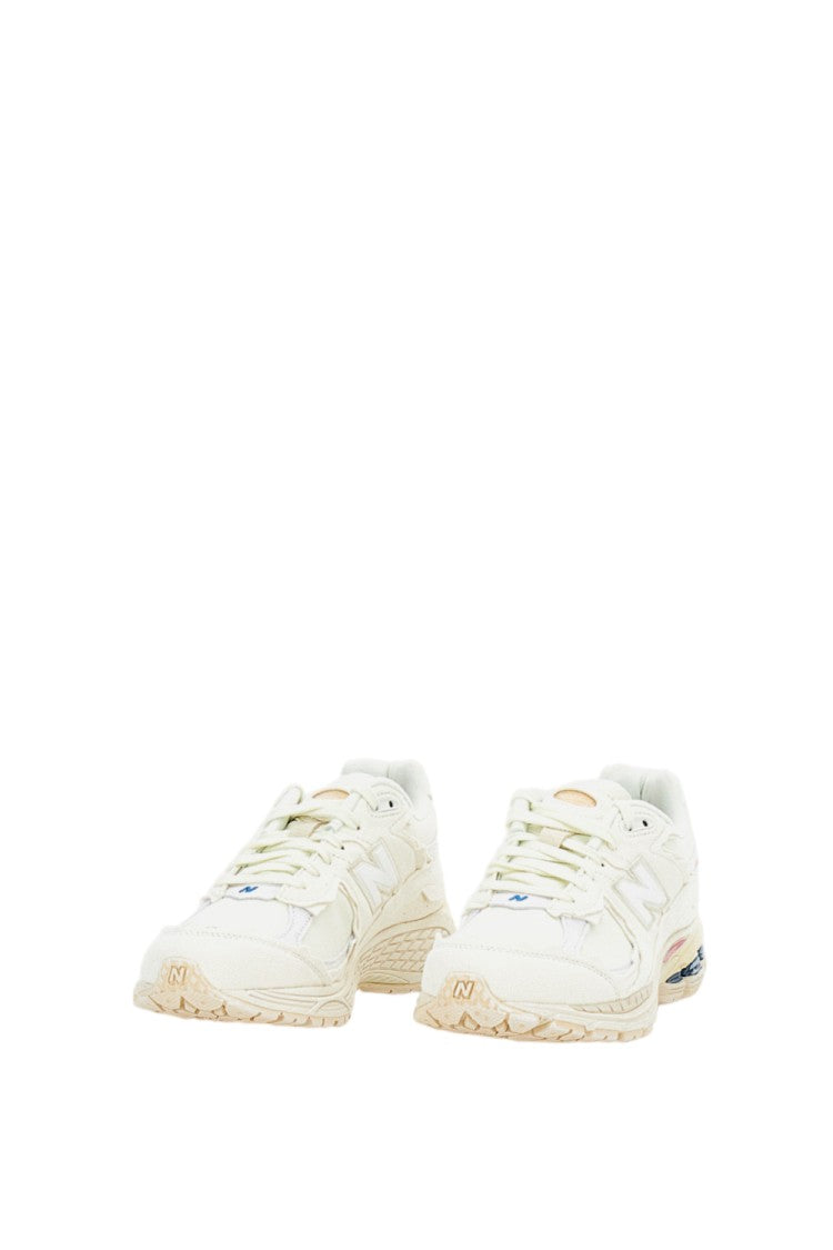 New Balance 2002R Protection Sneakers With Deconstructed Aesthetic