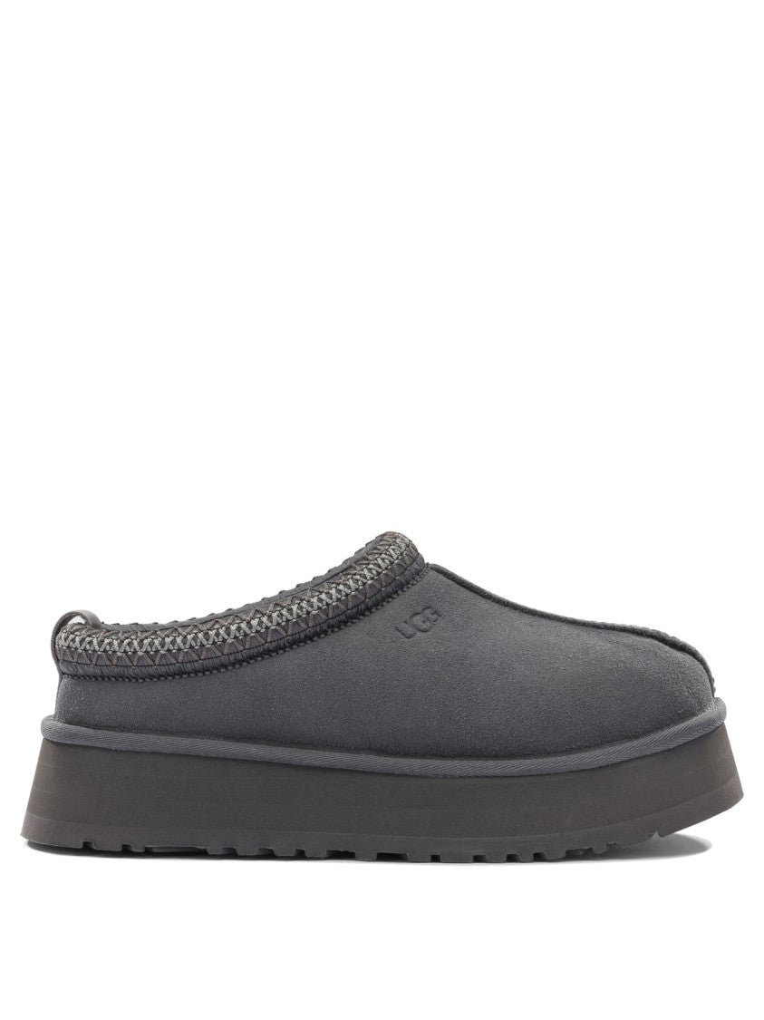 Ugg Black Slip-On Loafers With Braided Trim And Textured Sole