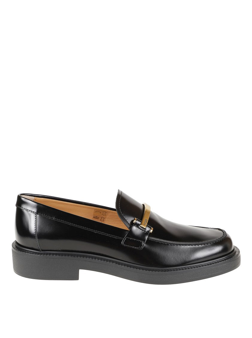 Tod's Polished Black Leather Flats With Gold-Tone Accent