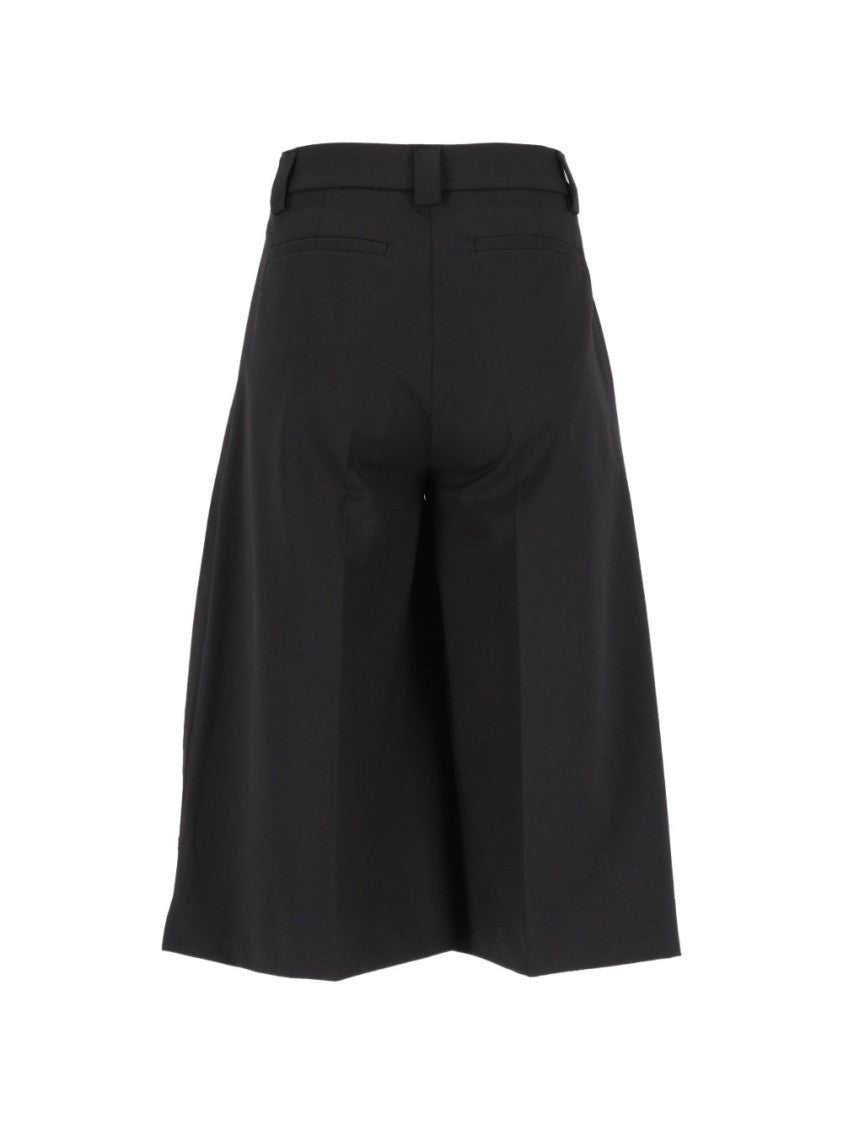 The Latest Dakota High-Waist Pleated Wool Wide-Leg Pants